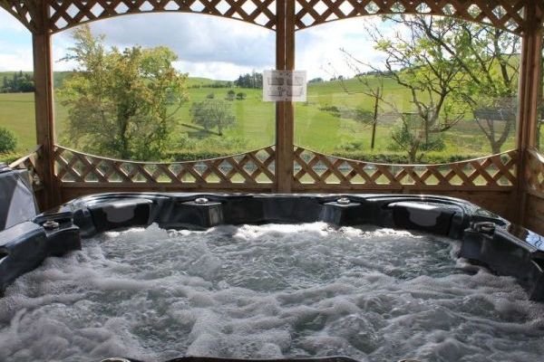 Hot tub within all weather gazebo