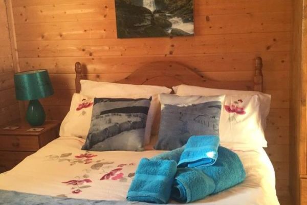 Double bedroom with walk in en suite shower room.