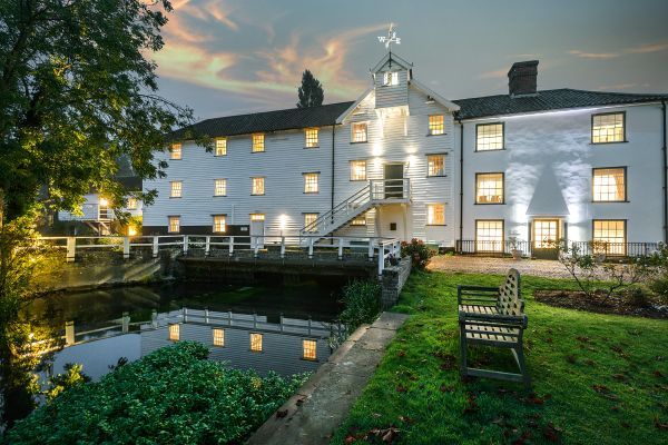 Main front of the mill at night