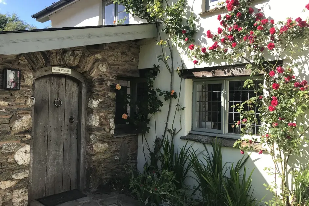 Middle Stolford cottage with roses around door