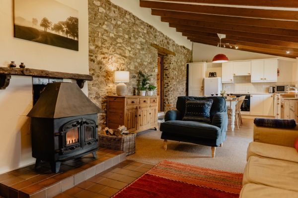 Beams & exposed stonework in Weathervane Cottage