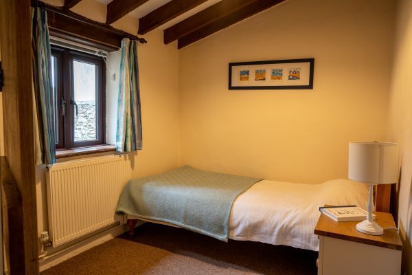 Single bedroom in Weathervane Cottage