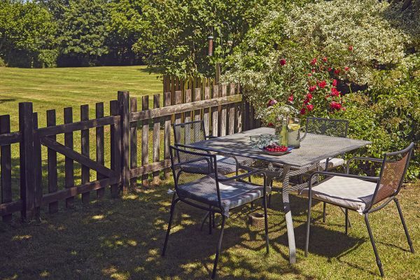 Enjoy a meal outside with a view of the meadow