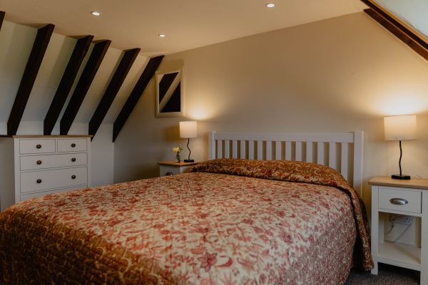 Double bedroom with king size bed at Meadow Cottage
