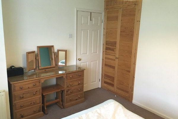 Dressing table with hairdryer in double bedroom