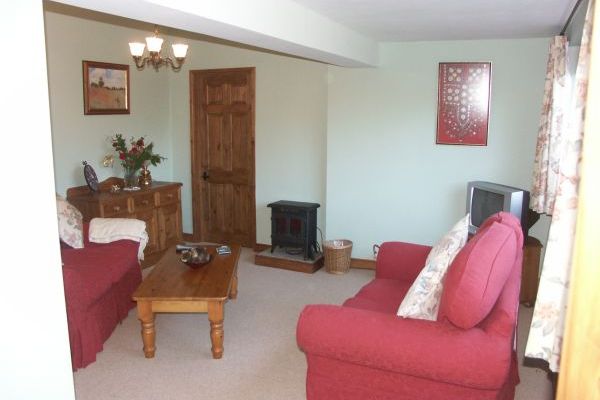 Lounge with door to master bedroom