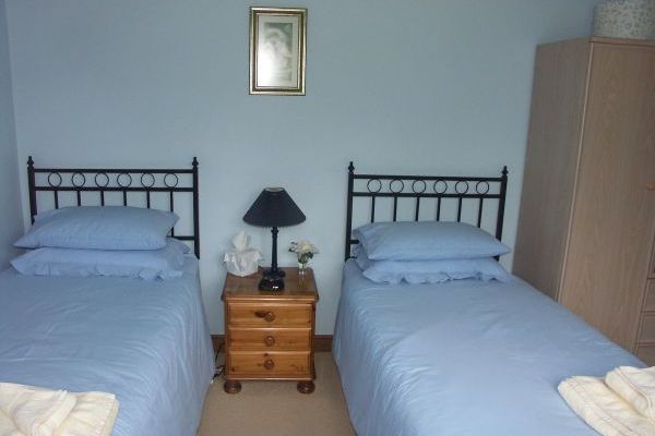 Second bedroom facing rear garden