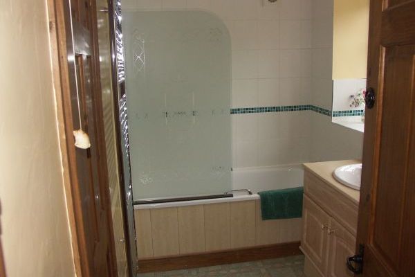 Bathroom with shower over bath