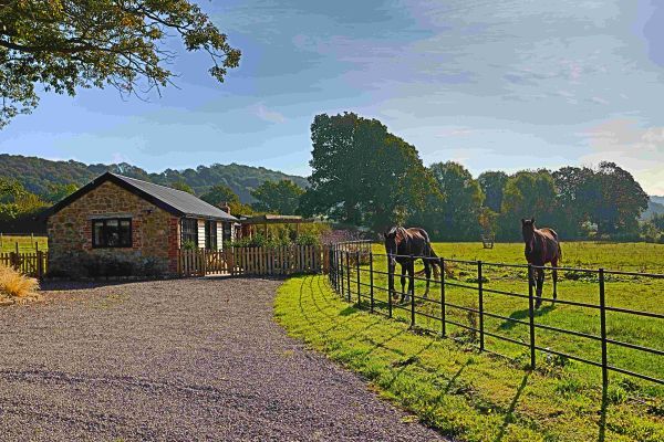 Field Barn sleeps 2, with a private Steam Room and AirCon!