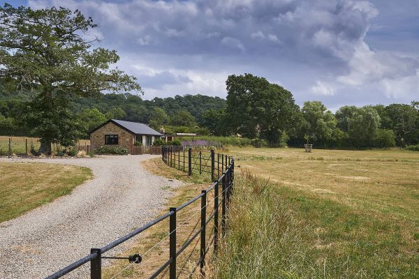 Field Barn sleeps 2, with a private Steam Room and AirCon!