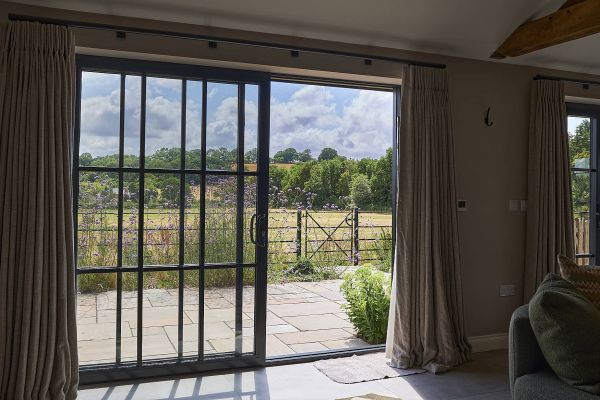 Field Barn sleeps 2, with a private Steam Room and AirCon!
