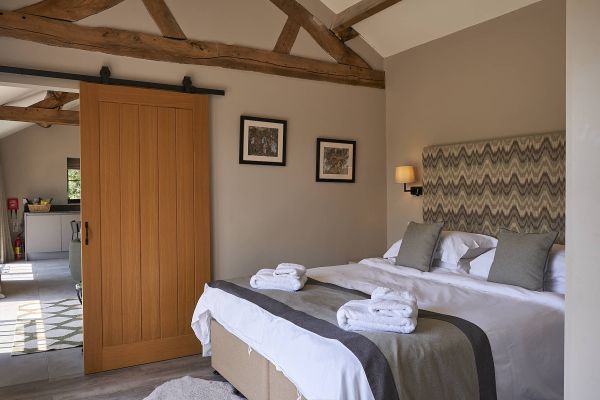 Field Barn sleeps 2, with a private Steam Room and AirCon!