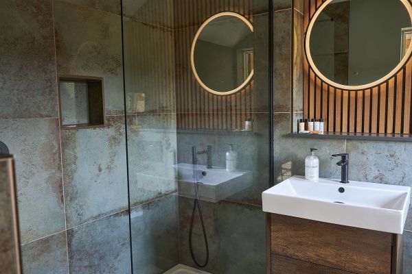 Field Barn sleeps 2, with a private Steam Room and AirCon!