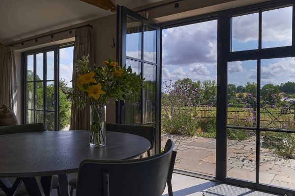 Field Barn sleeps 2, with a private Steam Room and AirCon!