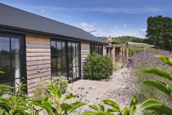 Field Barn sleeps 2, with a private Steam Room and AirCon!
